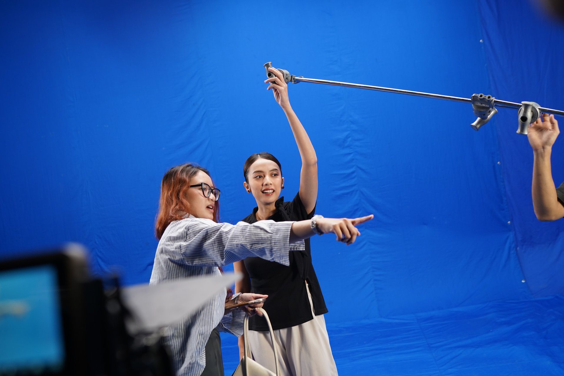 The Kunkun Visual crew shooting on the greenscreen stage in Bandung